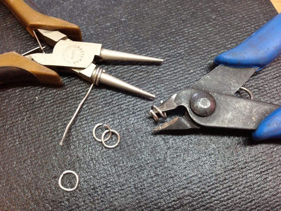 Make at least 6 jump rings from the thickest part of your round nose pliers. ("Making it Do with wire from a previous earring failure!)
