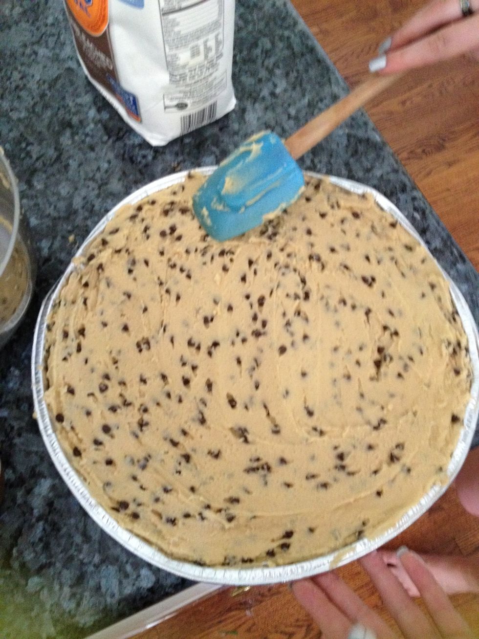 Make cookie dough and spread in pizza pan