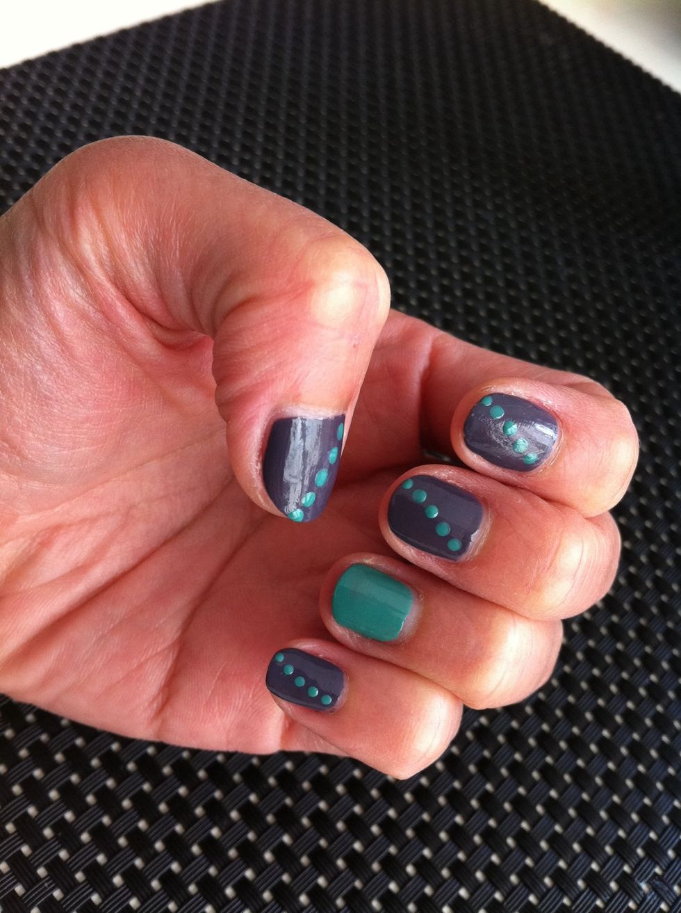 Make diagonal dots on all the nails except the two accent fingers.