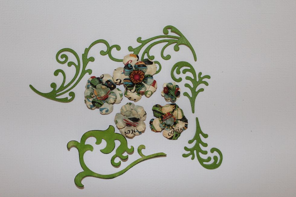 Make embellishments ( Flowers, swirls) and cut letters