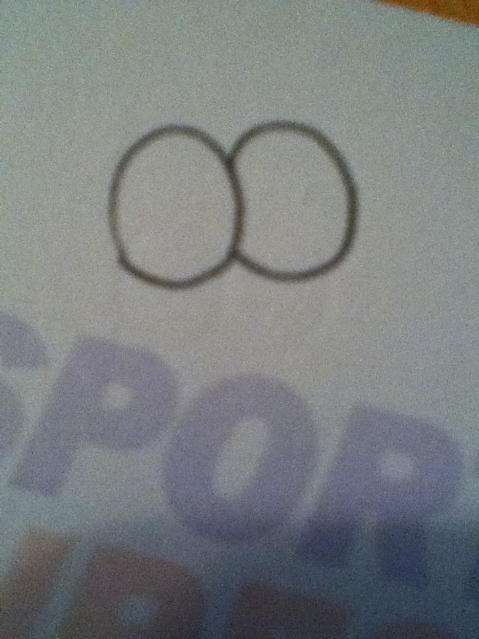 Make everything more curved and for best results make the eyes overlap