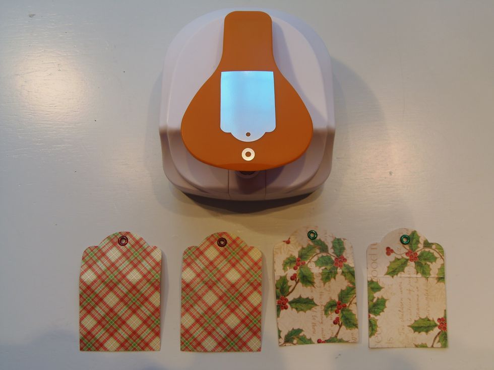 Make four tags using your favorite cardstock paper. To make the tags I used Fiskars  tag maker or trace and cut from another tag.