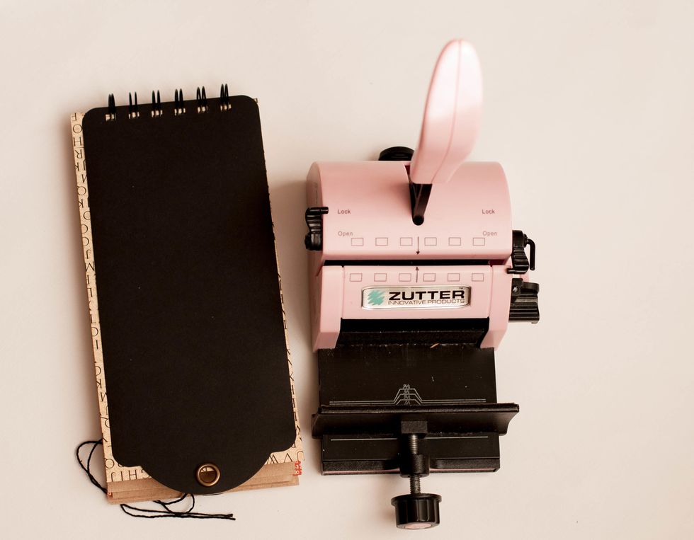 Make holes and put the spring