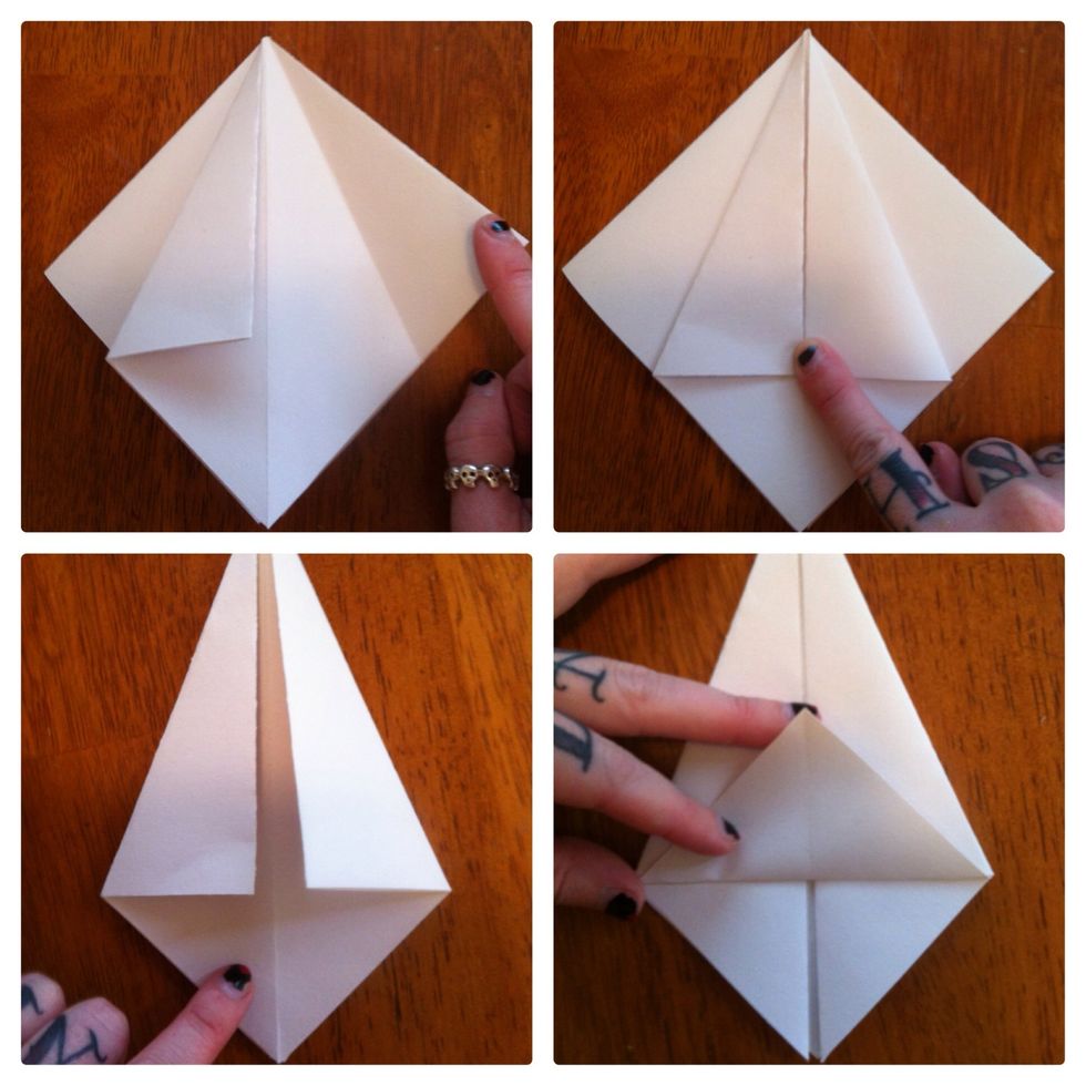 Make however many tree levels you want repeating all those previous steps. Make square base for trunk. Fold top corners to center. Repeat on back. Now take the bottom triangle & crease up.
