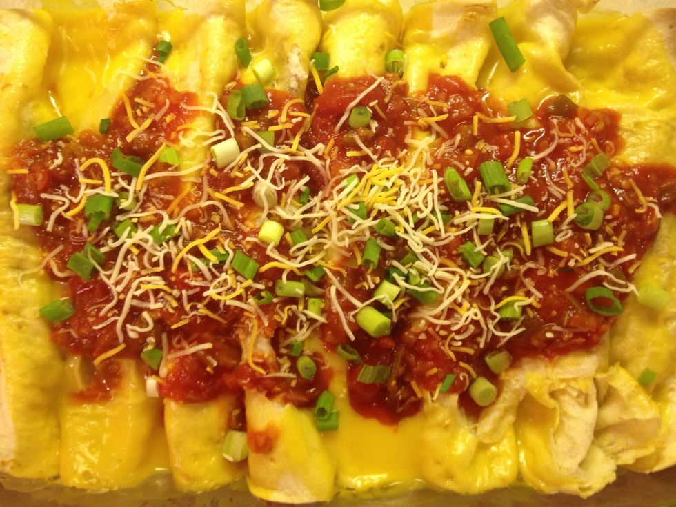 Make it pretty. I added some green onions and shredded cheese. You can add sour cream, black olives, guacamole, whatever you like!