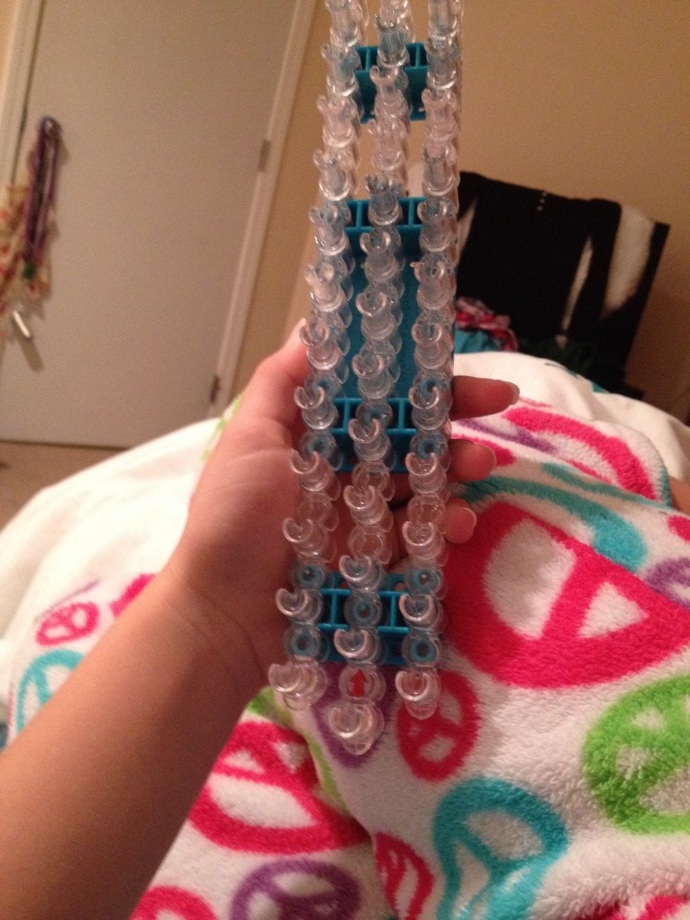 Make it so the arrows on the loom are facing away from you.