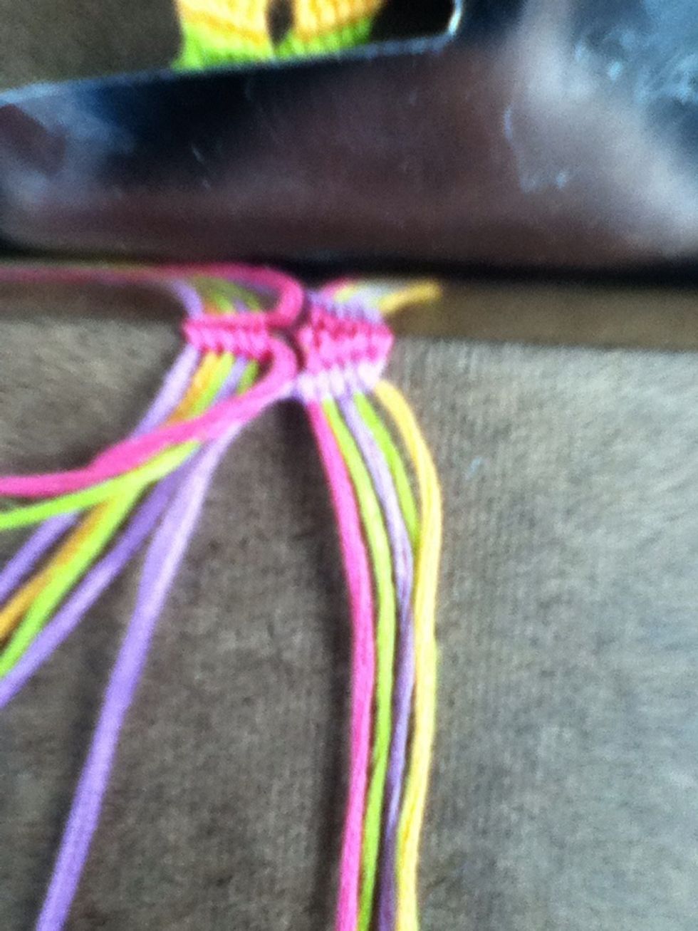 Make left knots on the 4 strings to the right.