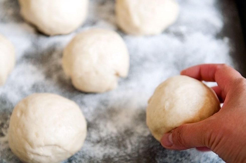 Make little balls from the dough, make small balls if u would like small naan, make big balls if u would like the naan to be fairly big in size.
