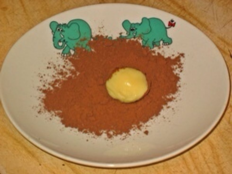 Make little balls with your fingers, kids can help you as it will feel like home clay work lesson for them )) and dip them in cocoa powder, icing sugar or coconut. Some nuts can be added inside