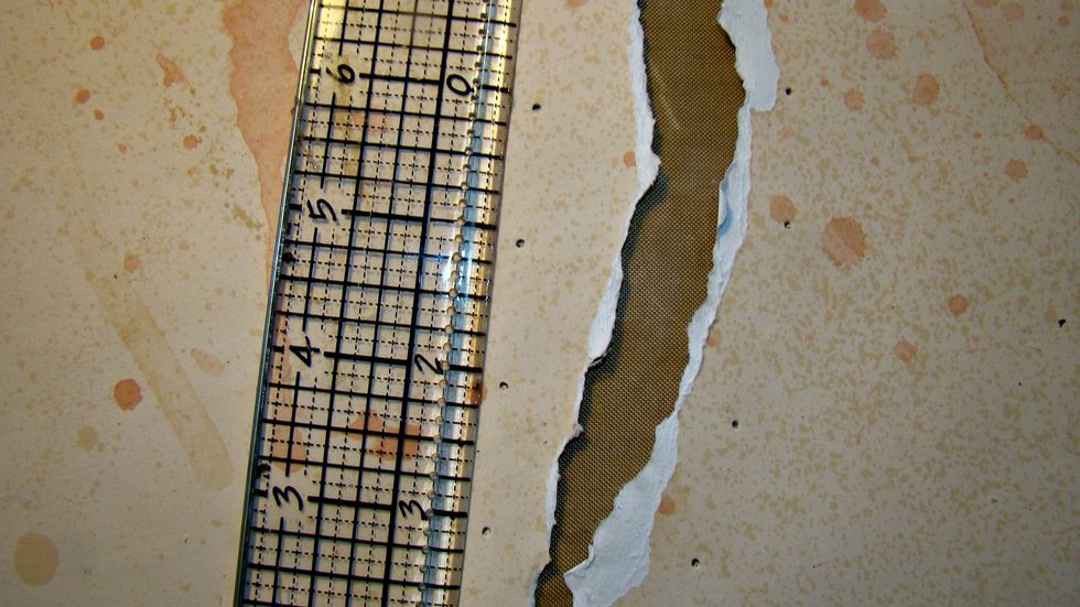 Make little holes to provide a template for adding your eyelets for lacing.