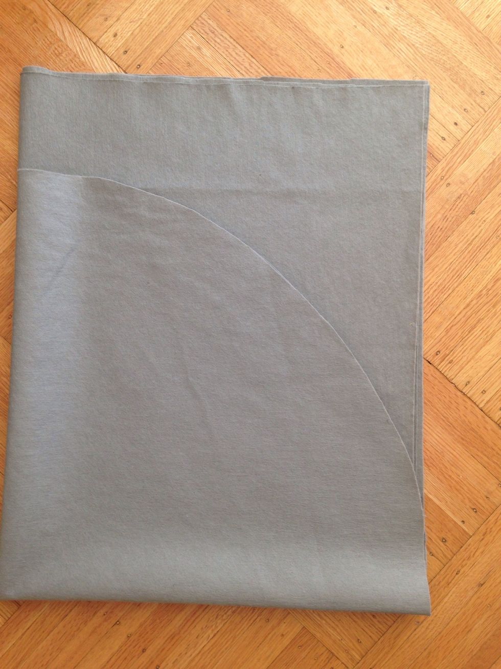 Make marks all along the 18" point creating a quarter circle and then pin it together. It's an important step to get a clean cut along your line. Now cut it along that line.