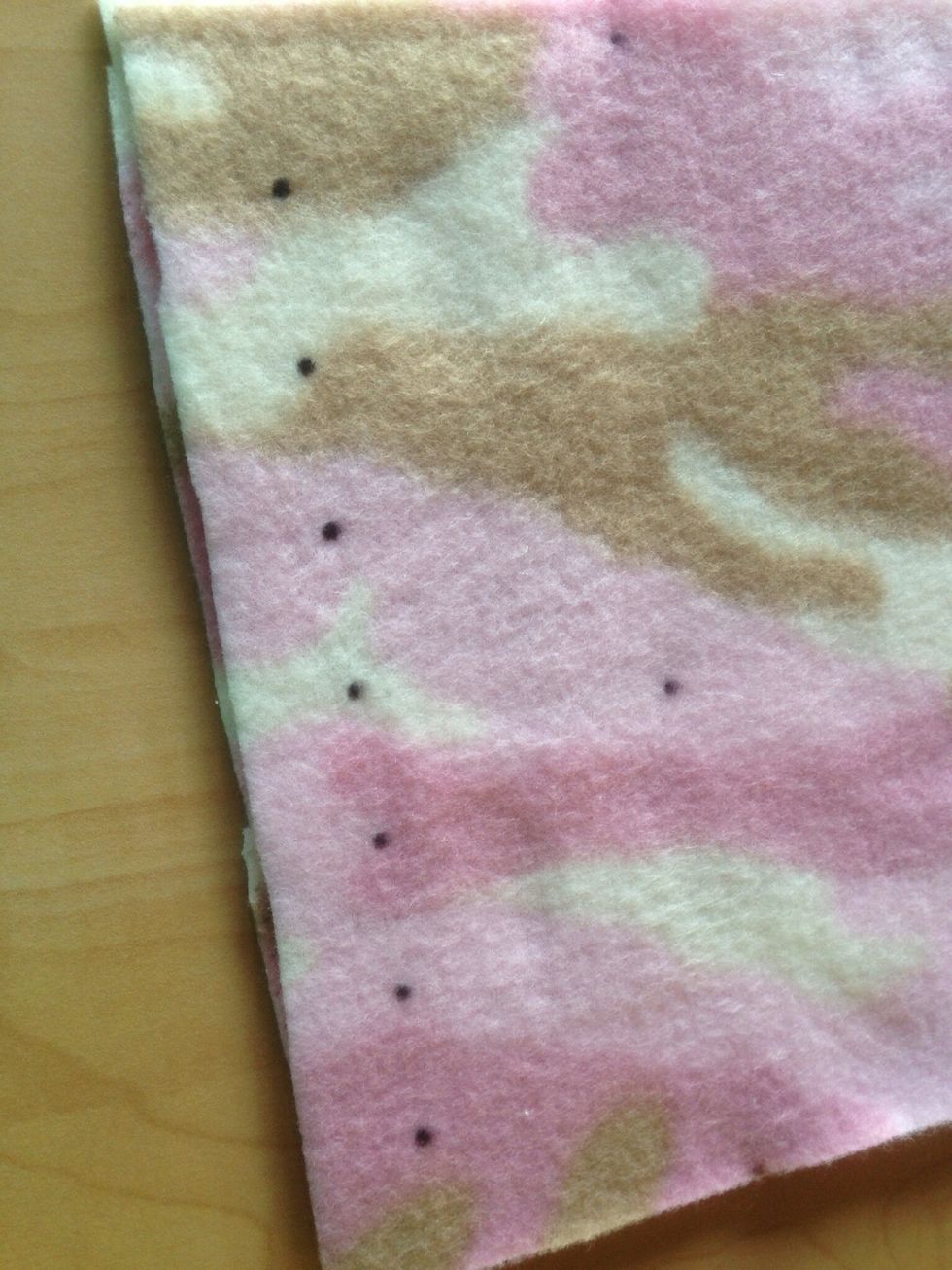 Make one inch marks along the two eight inch ends. This will be your fringe. Mark four inches high. This is how far up you will cut your fringe to.