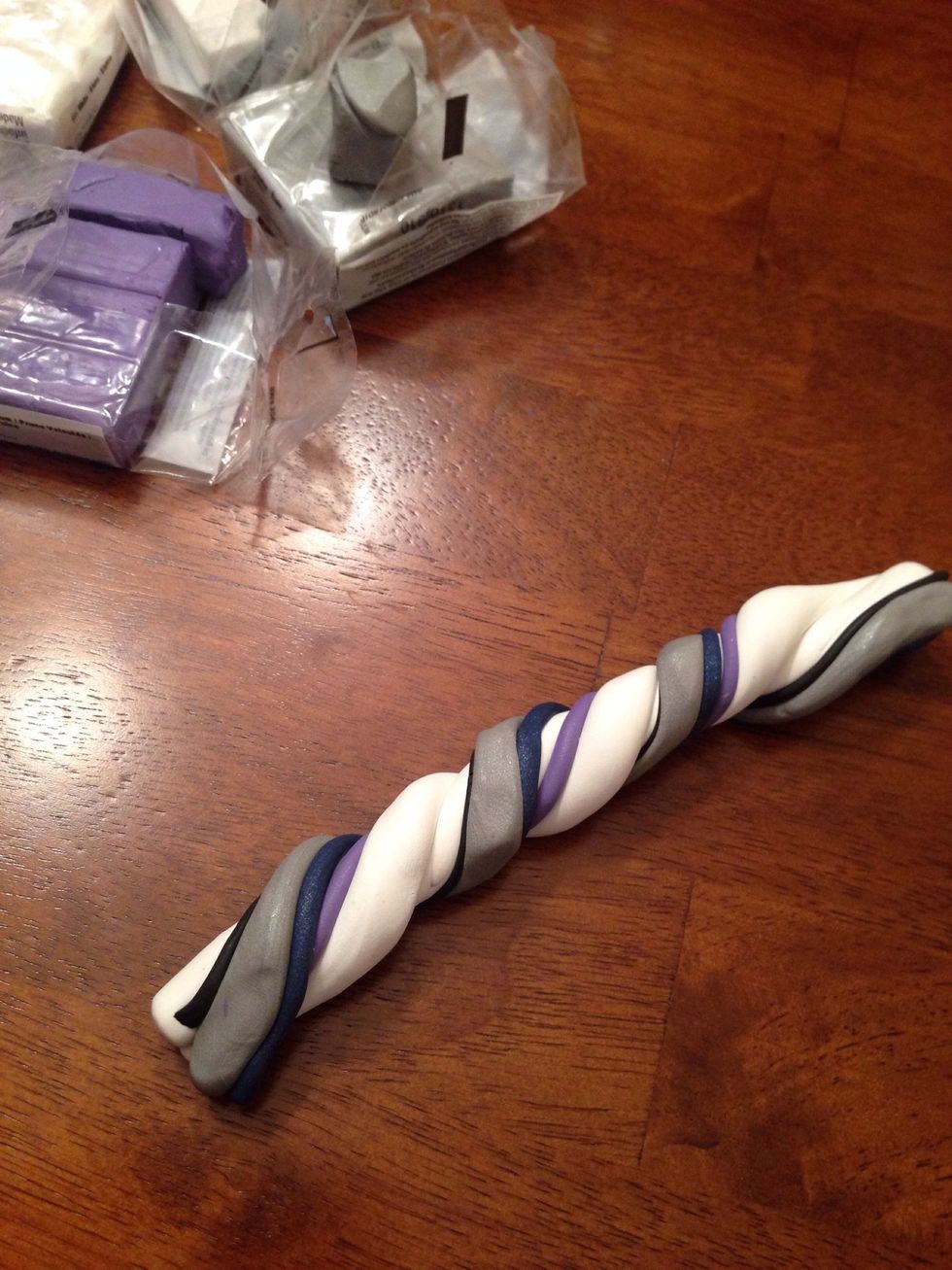 Make one large roll with your individual 5" rolls and twist. Twist the large roll out to 10" and fold in half.