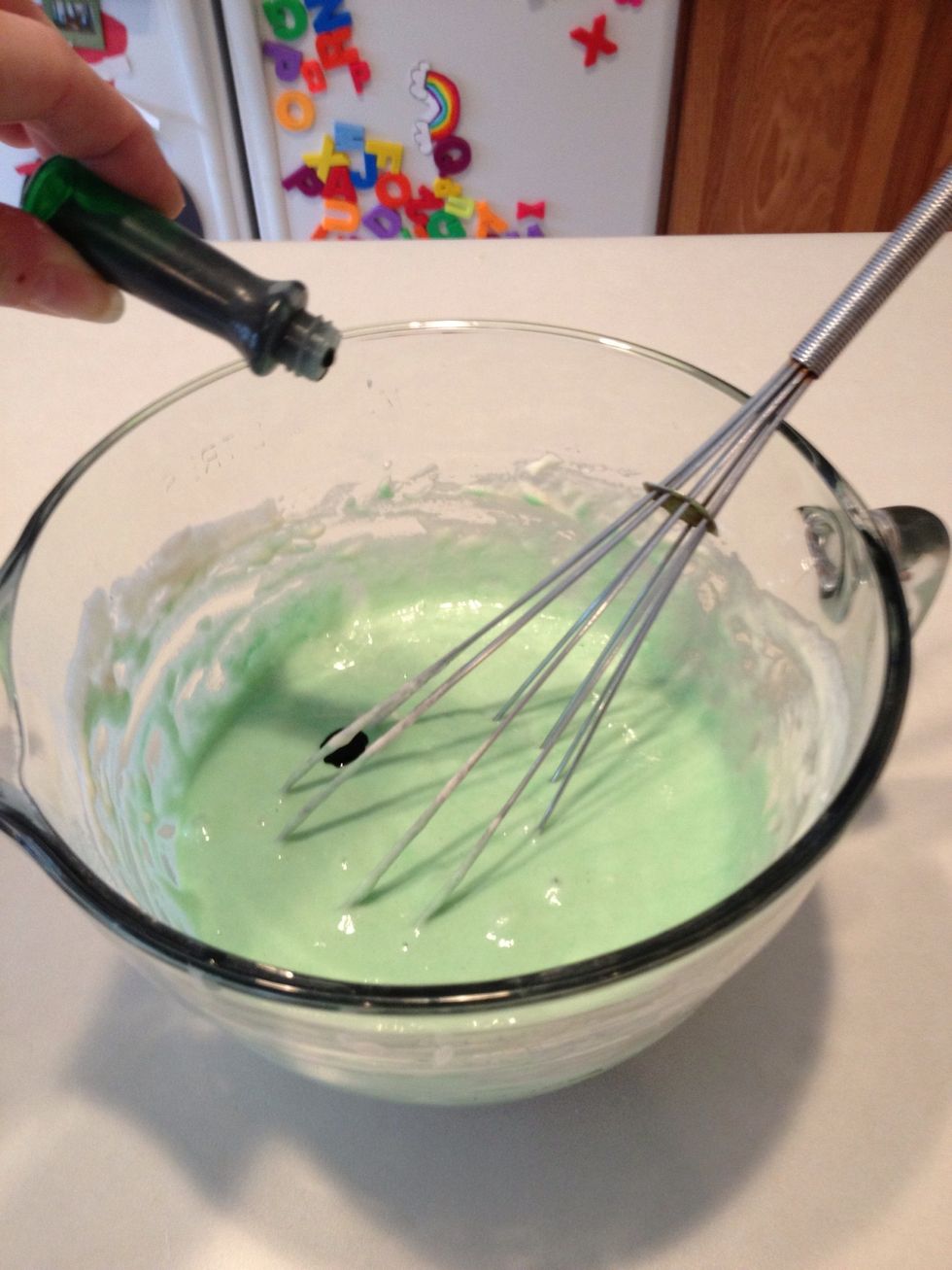 Make pancake mix in a large bowl. Add several drops of green good coloring and mix well. You can also add a few shakes of vanilla extract for more flavor.