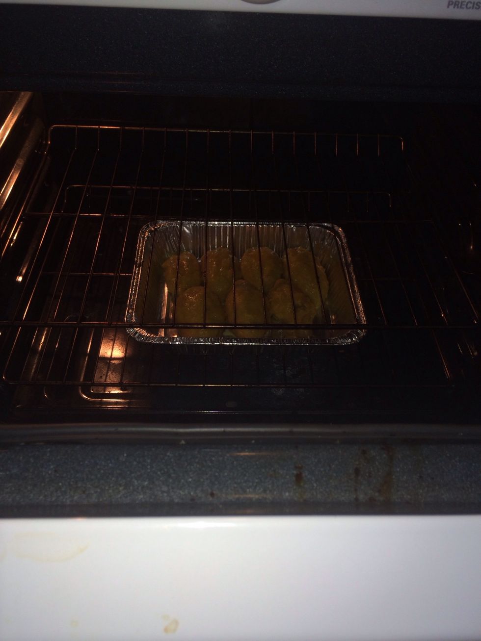 Make patty of plantain mash and place small amount of chicken mixture in it. Cover with more plantain mash ...work into a ball. Place in greased baking sheet or pan.