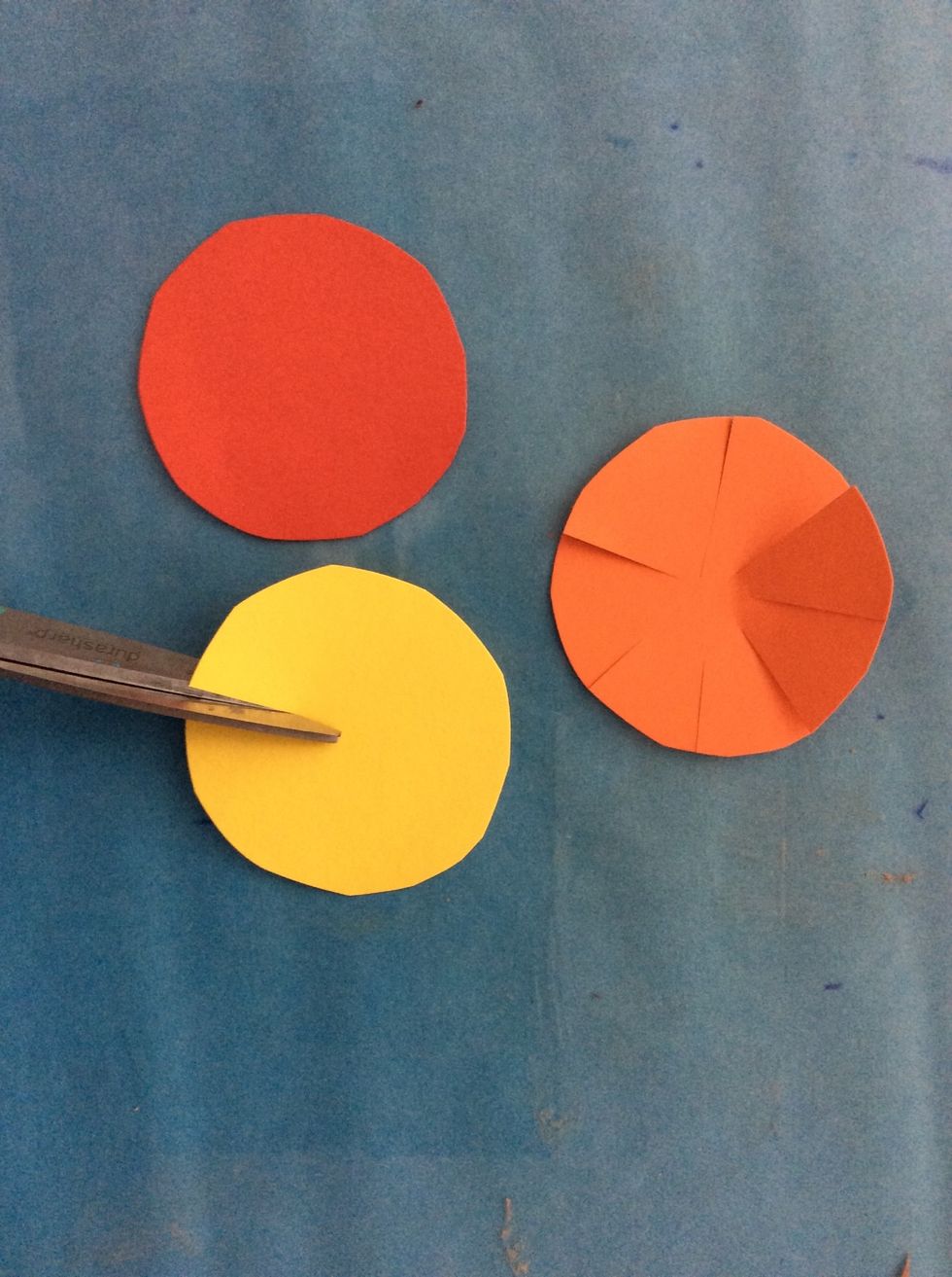 Make petals by cutting toward the center, all around. Pull petals up some.