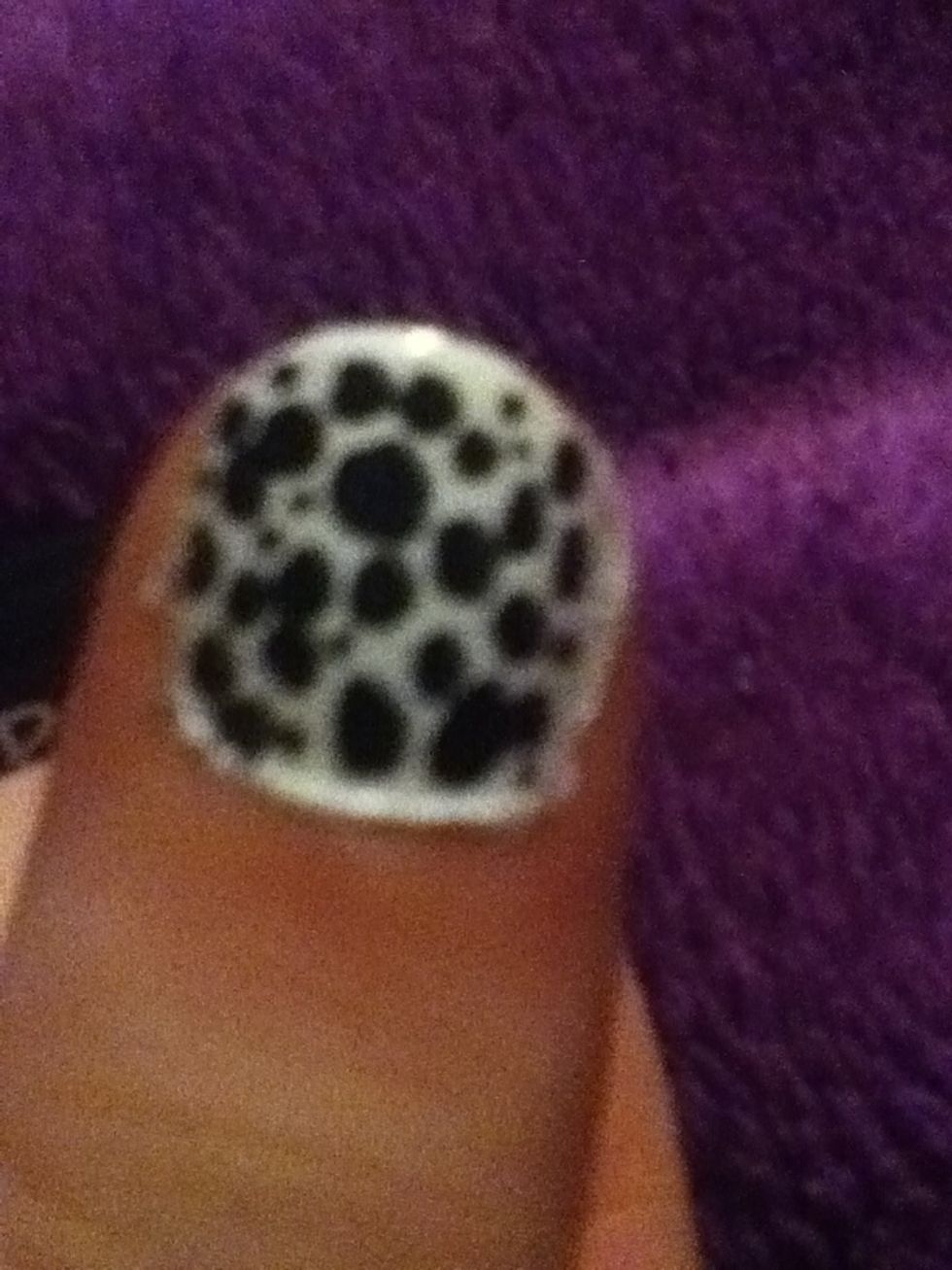 Make random dots all around dry white nail. Big or small whatever you choose!