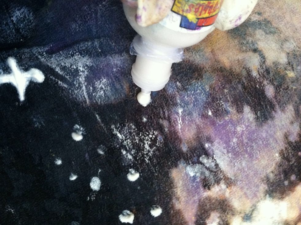 Make random dots everywhere on your shirt with silver fabric paint.