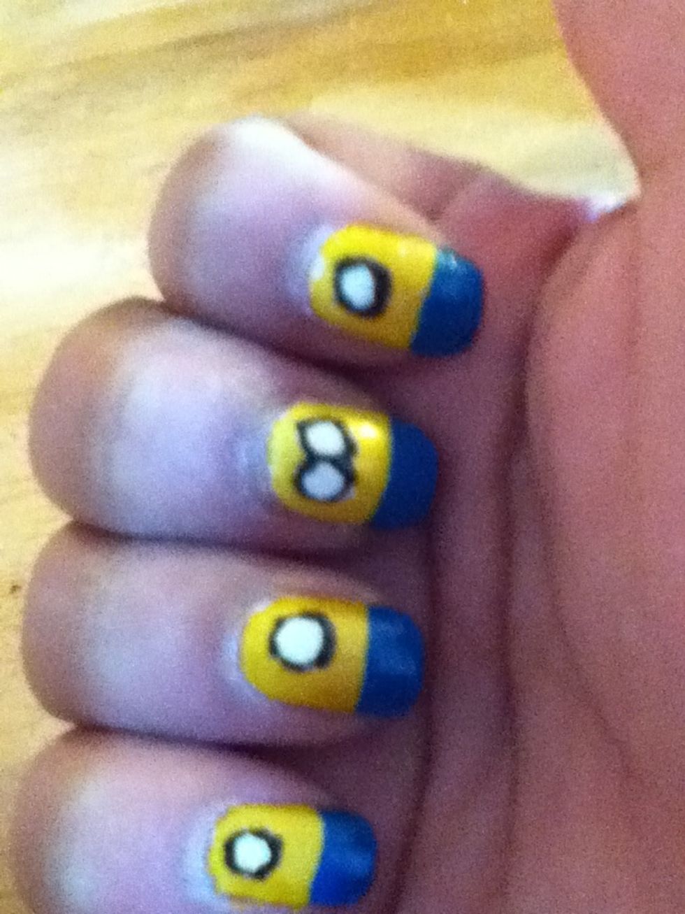 Make rings of black polish around white