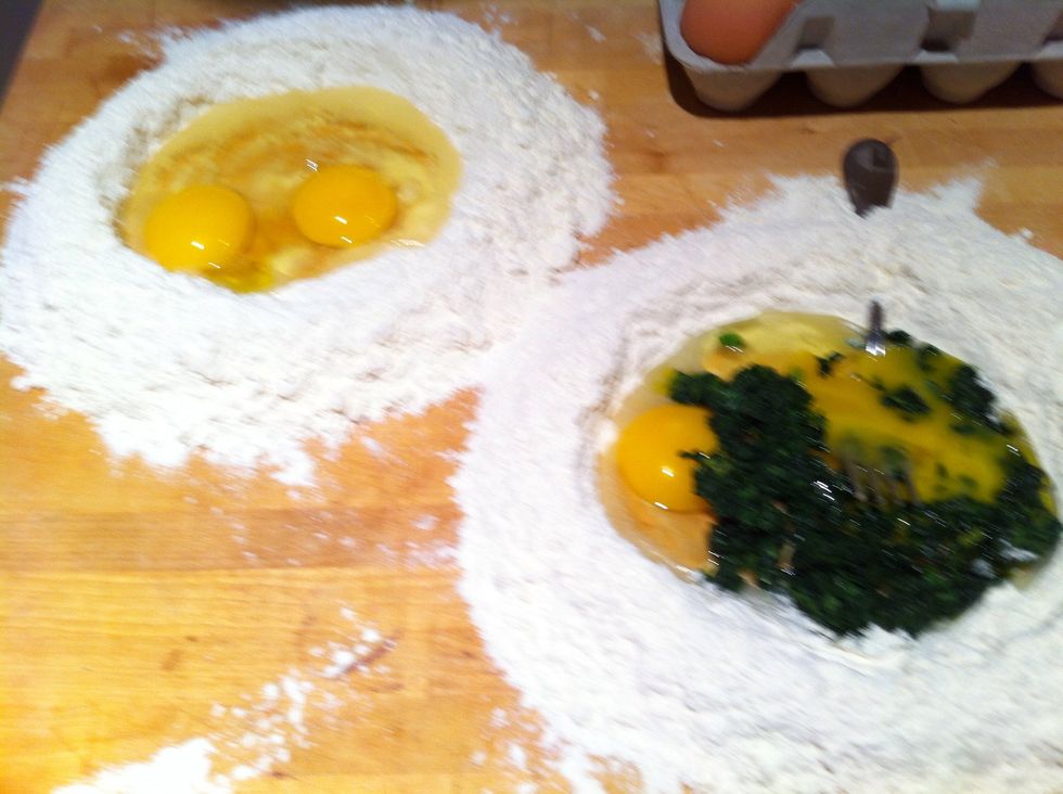 Make separate pasta wells. 1 1/2 C flour per well with 2 eggs. Spinach in one