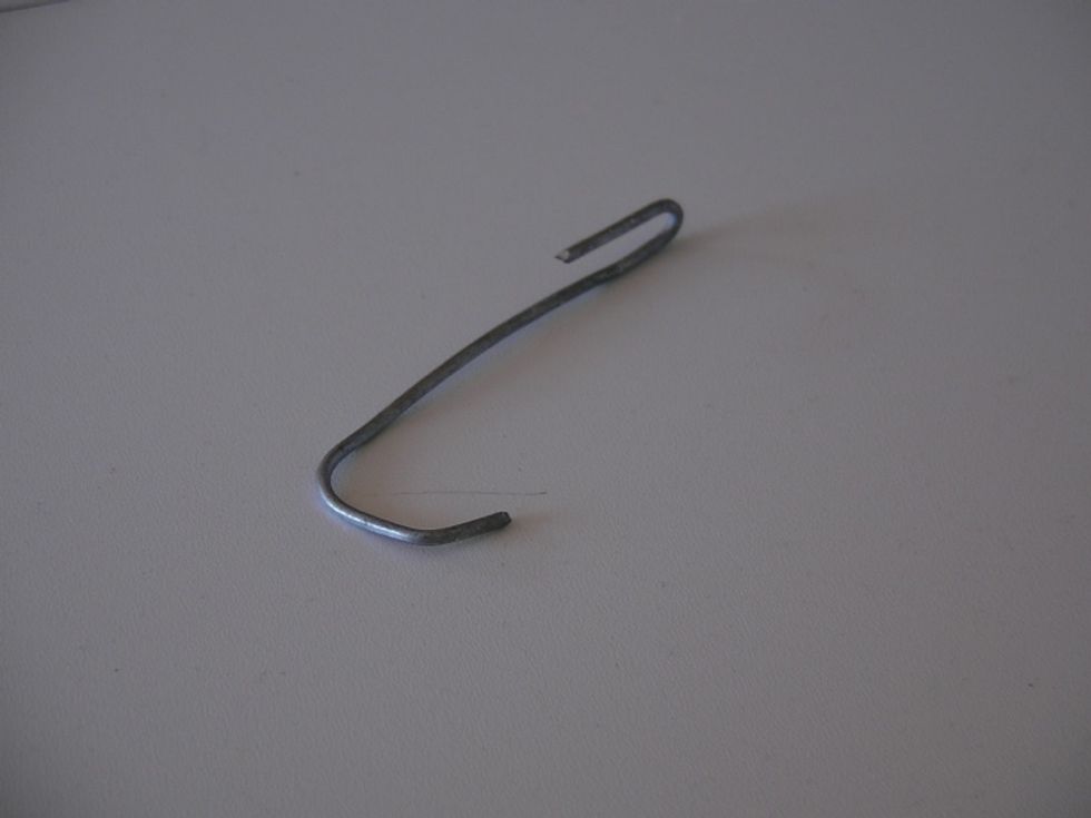 Make several of these hooks. You'll need 4 to attach the holder to the chain, and then some for the pots and pans. The thinner hook (at top of photo) is the part that will attach to the steel bar