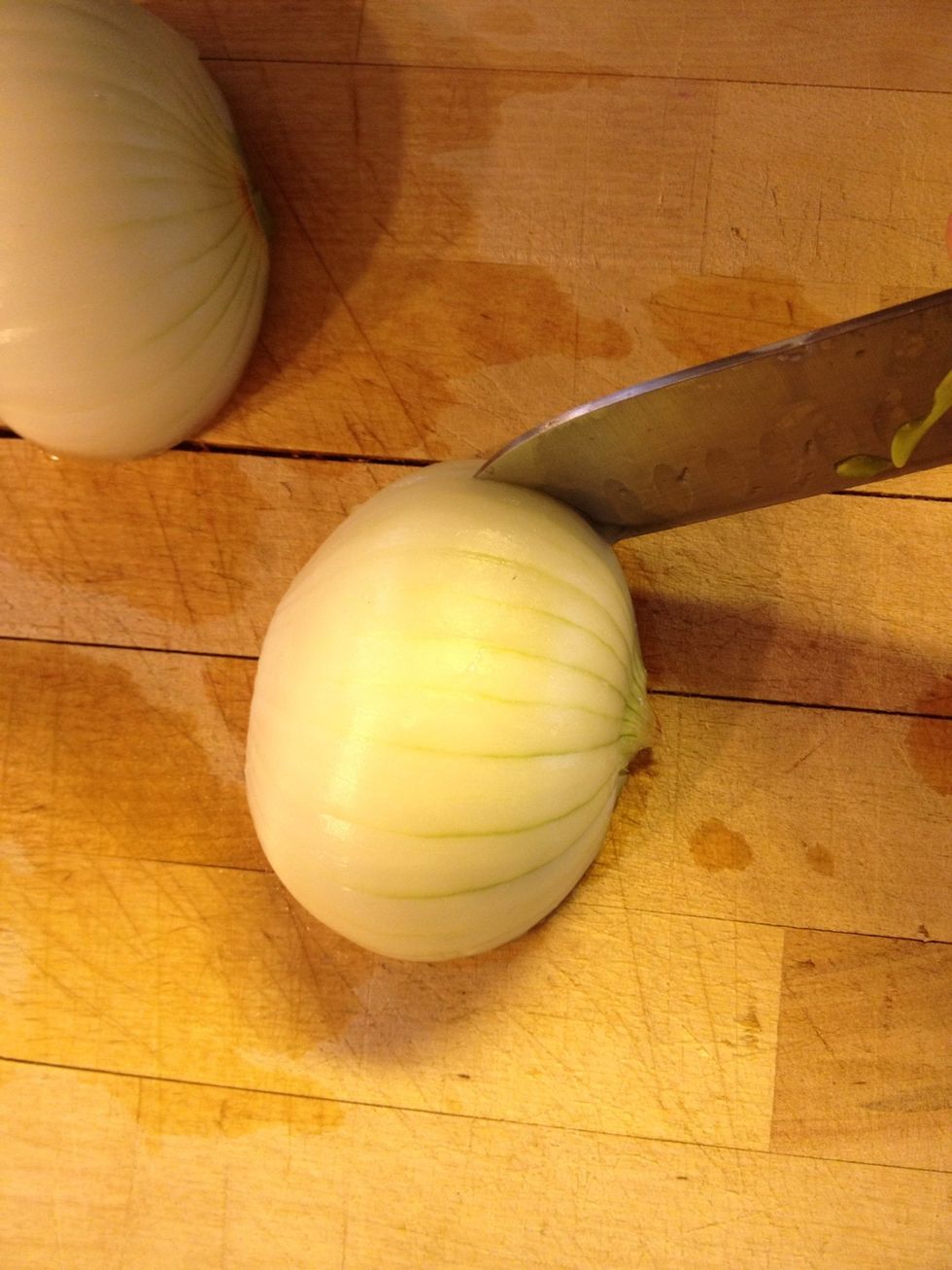 Make slits across the onion from top to bottom