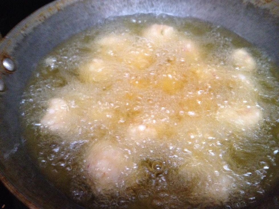 Make small balls with the batter we made and start frying. These might stick but don't worry once they get half aw cooked you can break them off with a spoon.