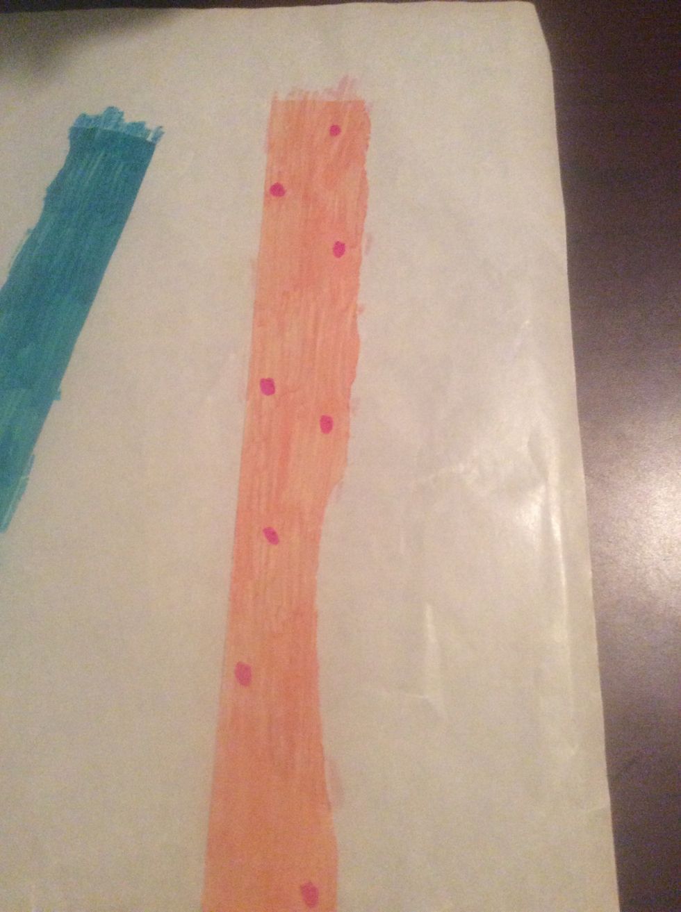 Make small dots of pinks and reds you could even use green to make it look unripe