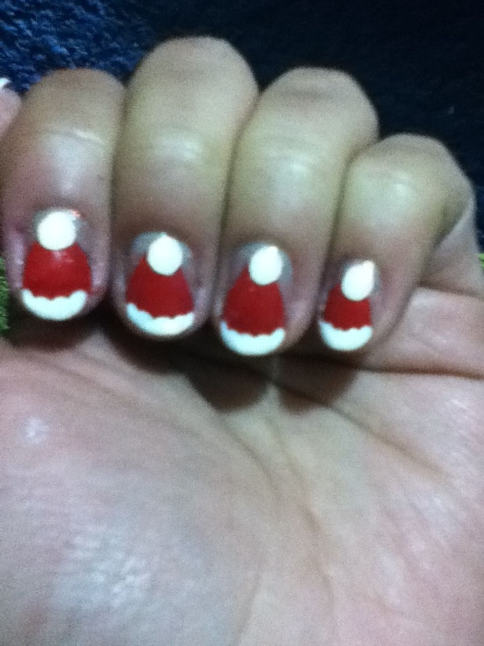 Make small dots with a dotting tool in the tip of the triangles