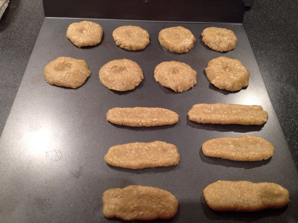 Make small pieces and shape them as you like. Add to a biscuit sheet. Leave some space between them. As you will see I didn't left enough room.