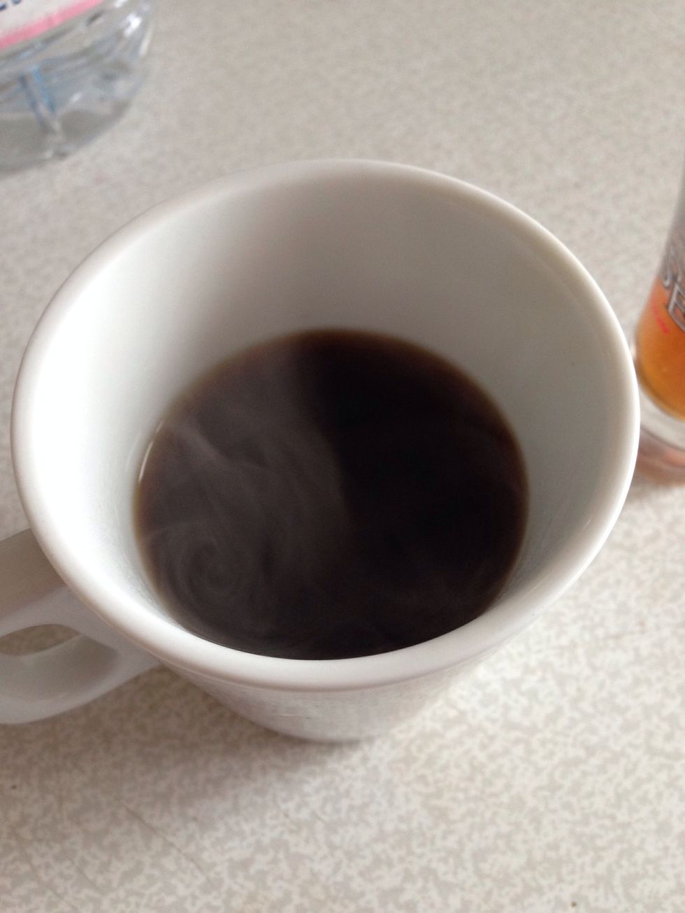Make some coffee to your taste (espresso, instant - anything you like)