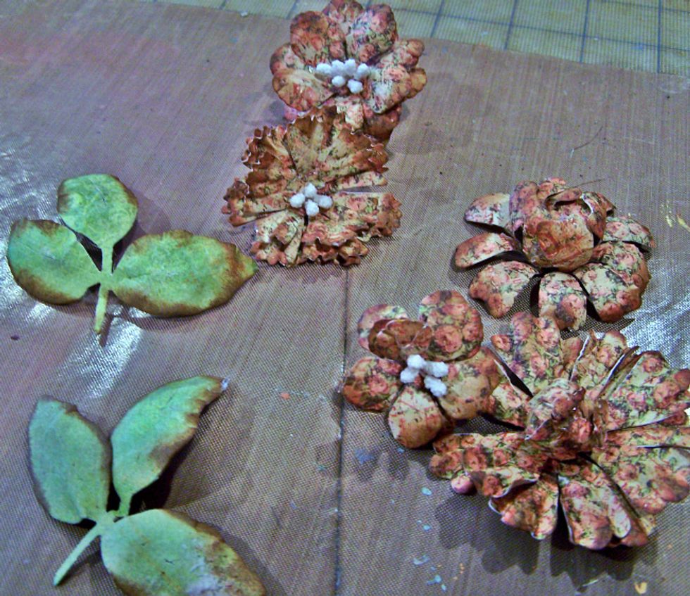 Make some flowers to coordinate with your layout using dies and patterned paper.