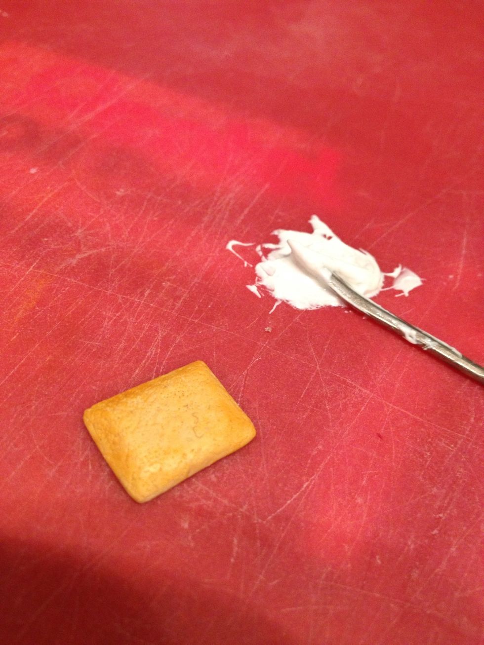 Make some icing by mixing TLS and white clay