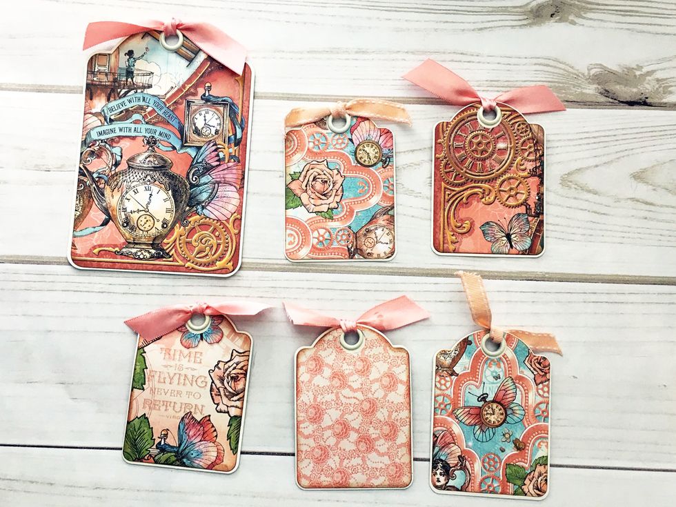 Make some tags to tuck in the pockets with Graphic 45's new tag dies!  I am so excited about these dies!