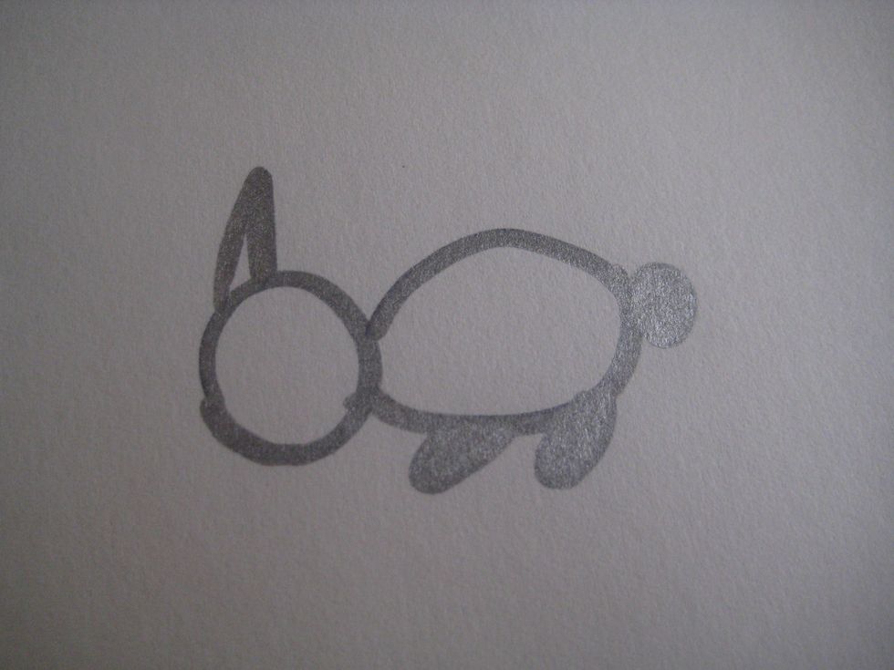 Make sort of like slanted triangle on top of the head for an ear.