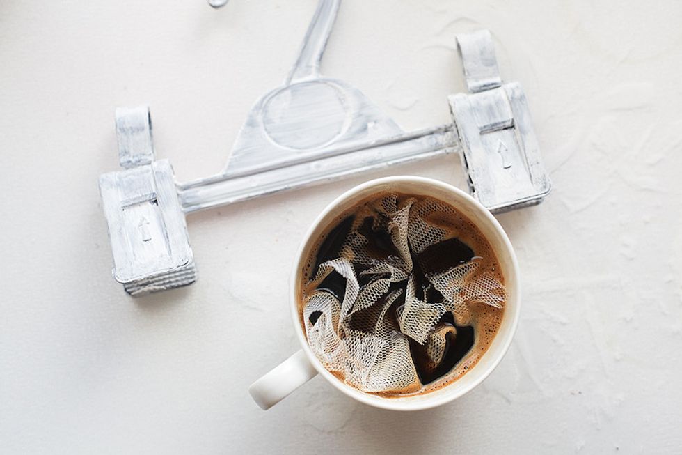 Make strong coffee and dip the mesh fabric into the cup for a minute. Then take out and dry.
