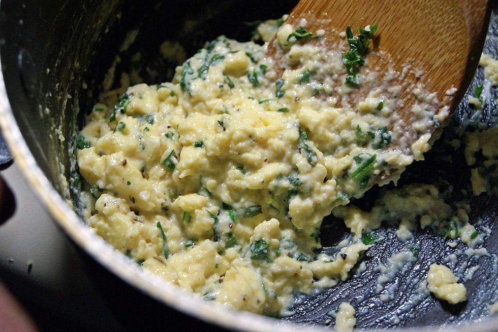 Make sublime scrambled eggs and add the green stuff. I used a chive and onion cream cheese in these eggs.
