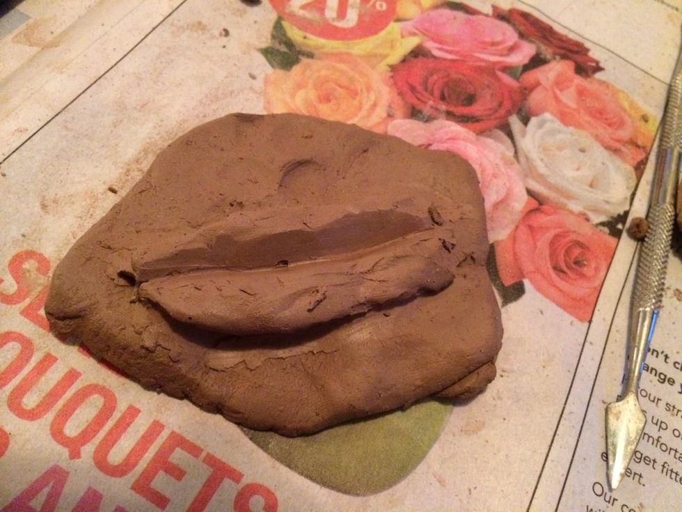 Make sure both lips are sculpted in the middle.