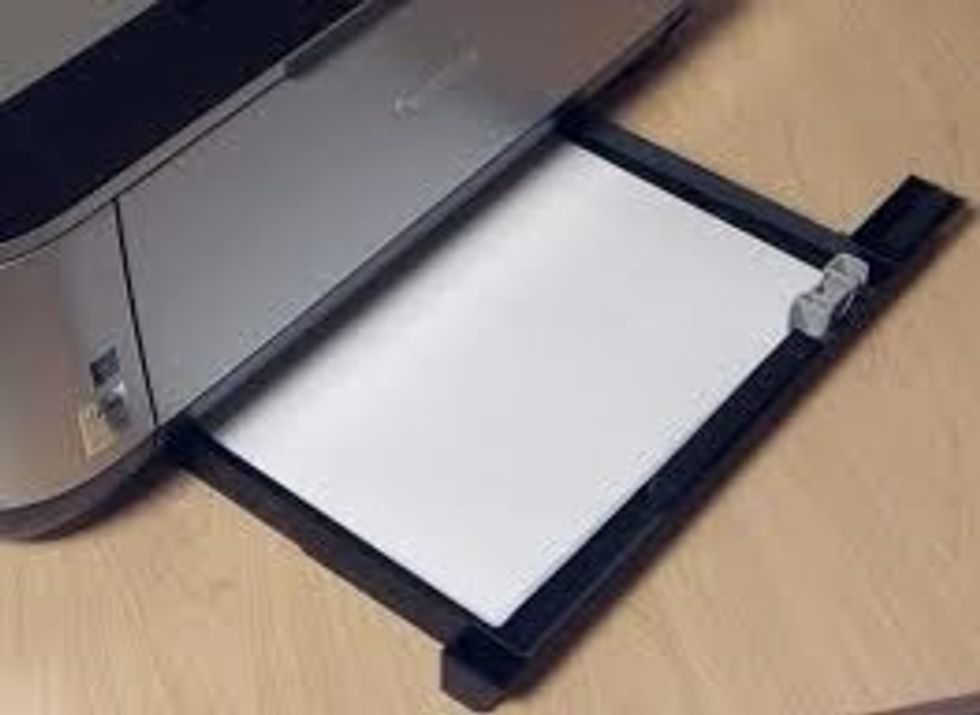 Make sure have paper in the printer tray