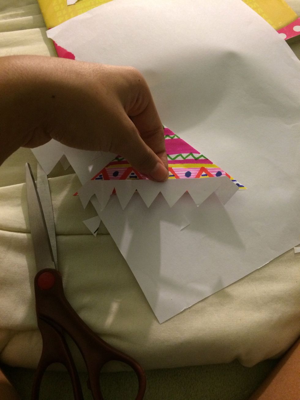 Make sure it fits and glue the teeth on the top flap inside.