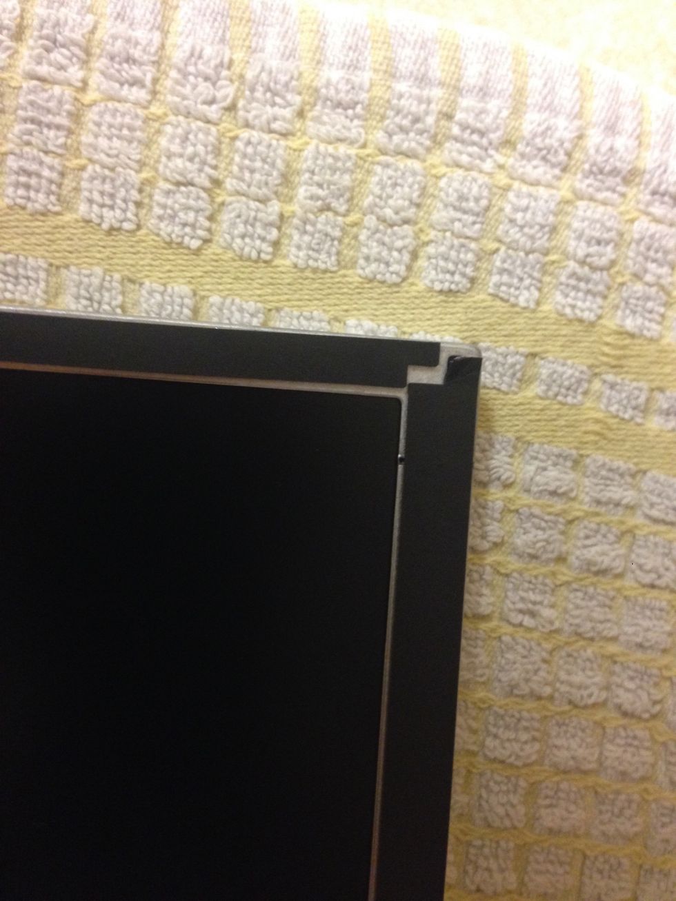 Make sure it's nice and flat and not overlapping the screen