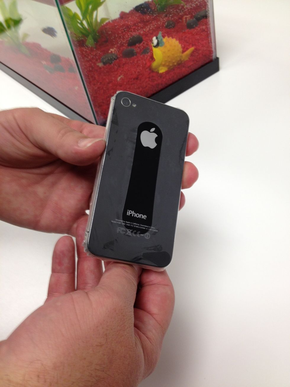 Make sure it's not off center or loose at all. If you have a bumper case, it will still fit over the phone. Stay fashionable and safe! What's that? Fish tank? Why yes, it is. We call it an aquarium.