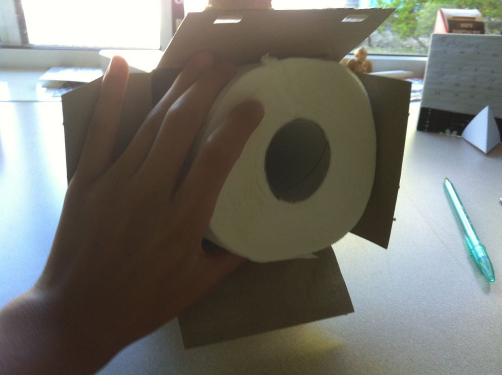 Make sure that your toilet paper roll fits snugly into the box