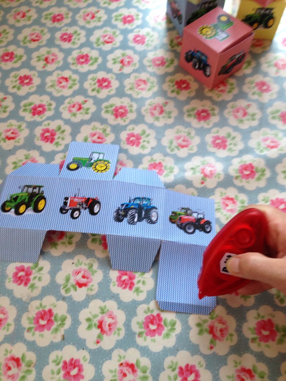 Make sure the box is the right way up and glue the four tabs starting with the thin tab as above. This is the base.