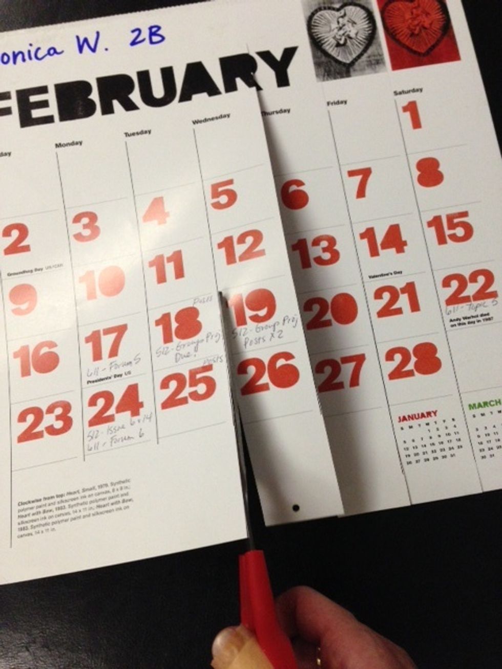 Make sure the calendar is on the number side. Starting at the bottom of the calendar, cut strips up to follow lines between the days of the week. Make sure to stop cutting at the month name.