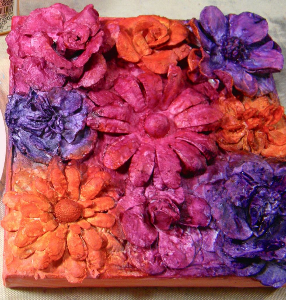 Make sure the canvas is completely dry before moving on.  I also used a bit of Zip Dry liquid glue to make sure the flowers were secure.
