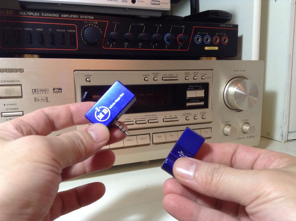 Make sure the IMB Music Transmitter is fully charged, then remove the transmitter from it's USB charger