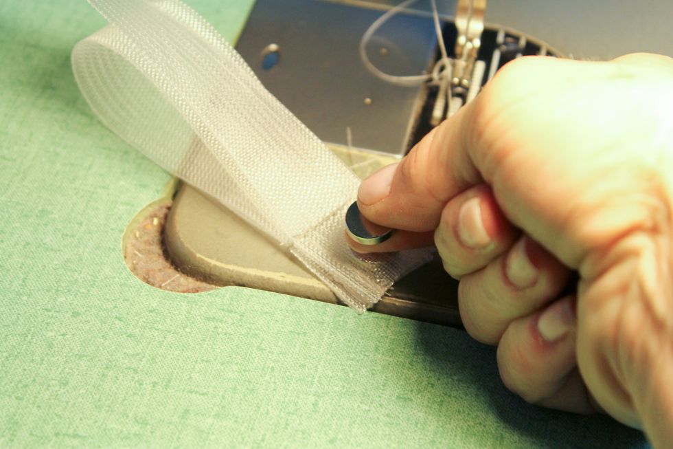 Make sure the negative and positive side of the magnet are connecting before you slip it in. They are hard to flip once sewn in CAUTION They hurt if your finger is in the way when they snap together