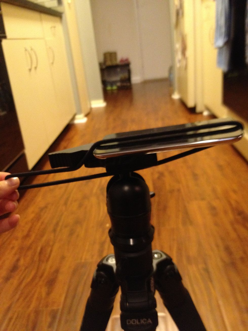 Make sure the part that you are holding is going under the handle.