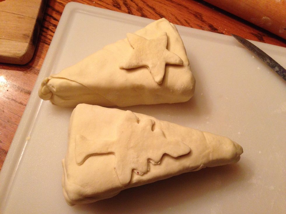 Make sure the pastry dough is thawed. Wrap Brie and cut off excess pieces. I decorated the Brie using a cookie cutter. Tree for the fig and star for the apricot!